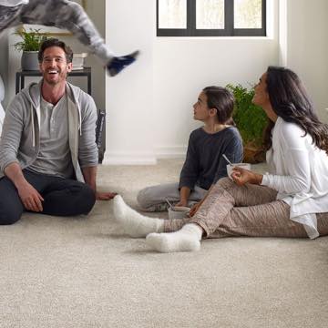 Family on carpet | Rockford Floor Covering