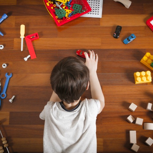 Boy playing on vinyl flooring | Rockford Floor Covering